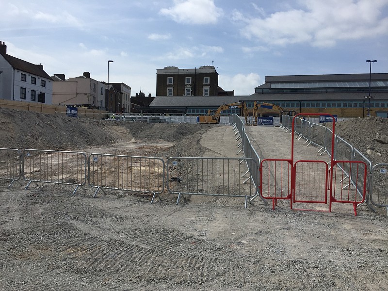 Site ground being flated in preparation for works to begin